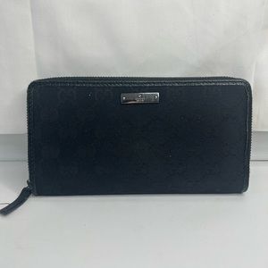 Black guccissima Gucci zippy long wallet